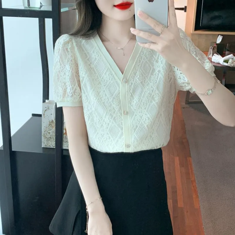 Hollowed-Out Lace Blouse