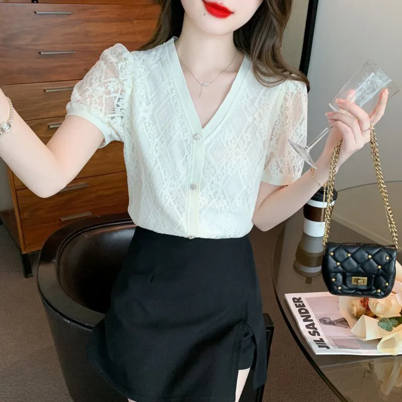 Hollowed-Out Lace Blouse
